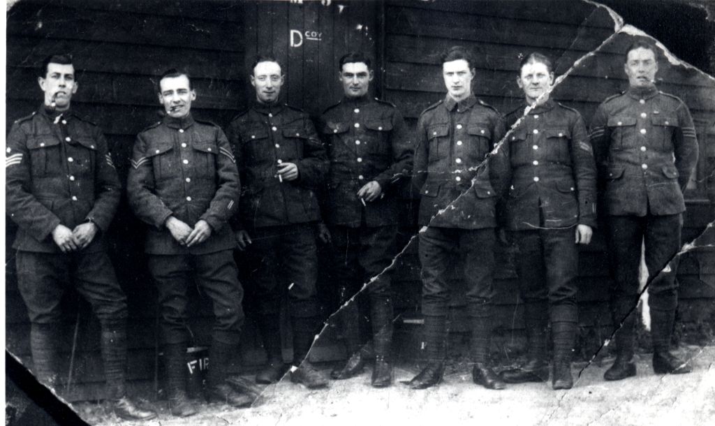 Joseph Arnold Sadler with a group of soldiers. He is far left