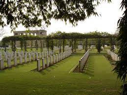Photo of Delhi War Cemetery. Rows of headstones.