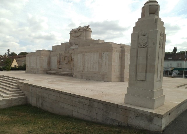 colour photograph of the memorial in white stone