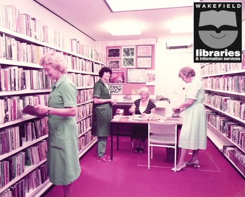 Pinderfields Hospital Library, Wakefield A colour photograph of the interior of Pinderfields Hospital Library, Wakefield. People are choosing books from the book shelves. Internal Ref: WF Local Studies Library