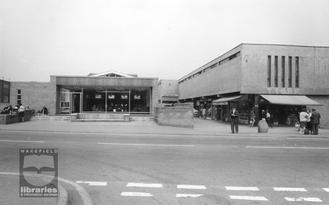 South Elmsall Library, and Queens Supermarket A black and white photograph of South Elmsall Library and Queens and Asda Supermarket, South Elmsall. The library was opened in 1966. Whilst now known as South Elmsall Library this was County Library, Barnsley Road, Moorthorpe. The supermarket, which stood on the site of the Old Palace Picture House, later became a Netto supermarket. The shop on the right corner was a fruiterer, with a cafe next door. Internal Reference: WR (LS) Frith Collection