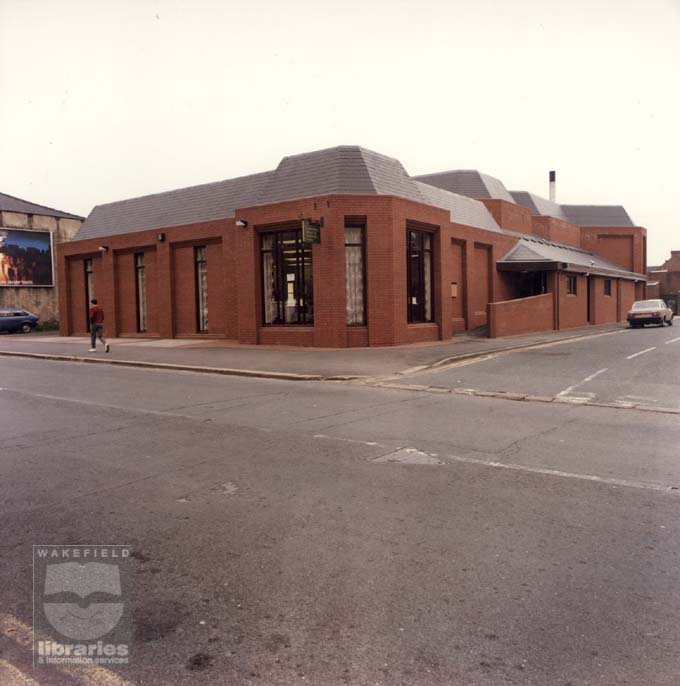 Featherstone Library and Community Centre A colour photograph of Featherstone Library and Community Centre on Victoria Street, Featherstone, from Station Lane. This library was opened in 1985 by Councillor Roy Widdowson, and built to replace the branch on Green Lane.